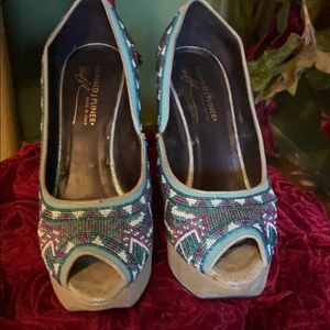 Beautiful beaded open toe pump.